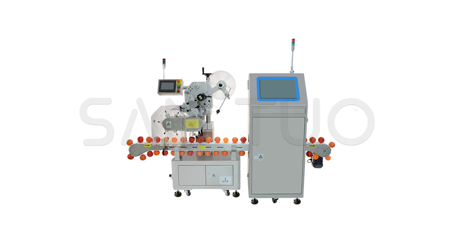 Fruit labeling machine